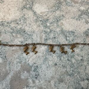 Gold-Tone Charm Bracelet with Female Profile Charms - Women’s Jewelry Bracelet